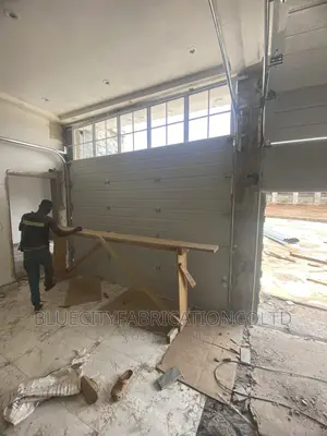 Triple Automatic Garage Door With Remote