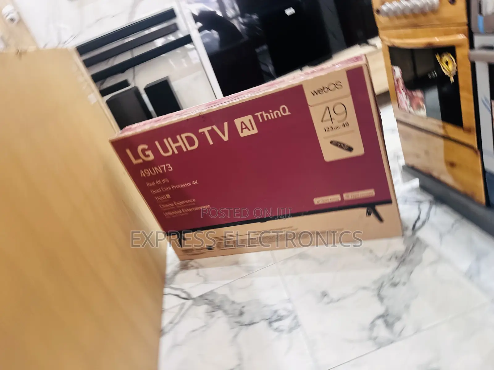 Less Expensive Sleek UHD Smart Glossy 49”UN7340
