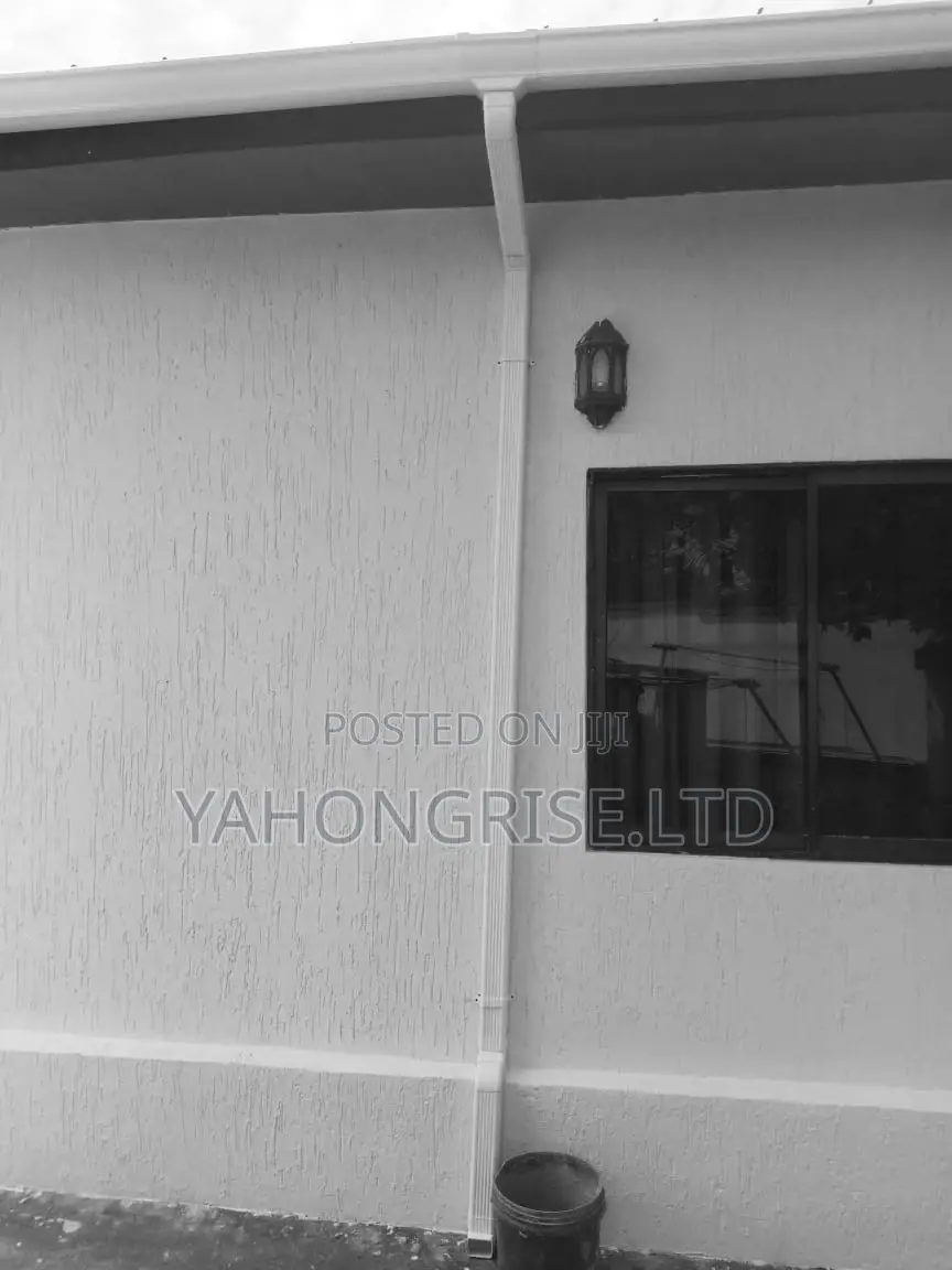 White PVC Gutter and Downspout