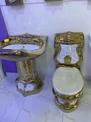 Golden Luxurious Water Closet With Standing Wash Hand Basin