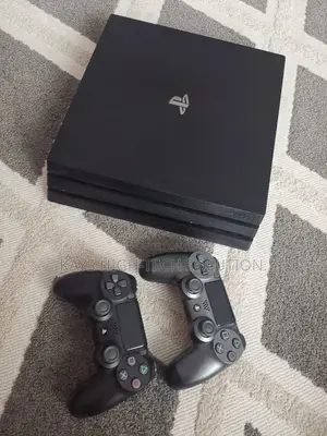 Playstation 4 Pro With 2 Controllers and Hot Big Games