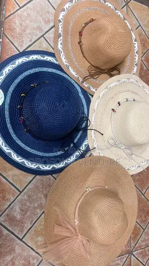 Ladies' Straw Hat or Beach Hat Available. Going for a Cool Price 