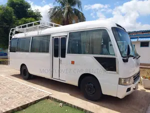 Car Rentals - 29 Seats Bus for Rent- Coasters Bus