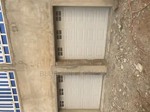 Automated Double Garage Door With Fanlight
