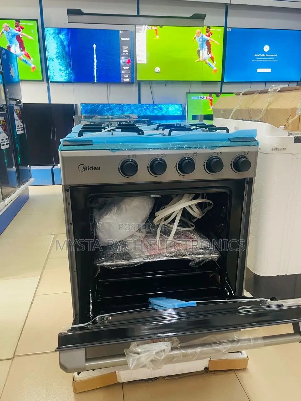 New Midea 60 by 60 4 Burner Gas Cooker + Grill