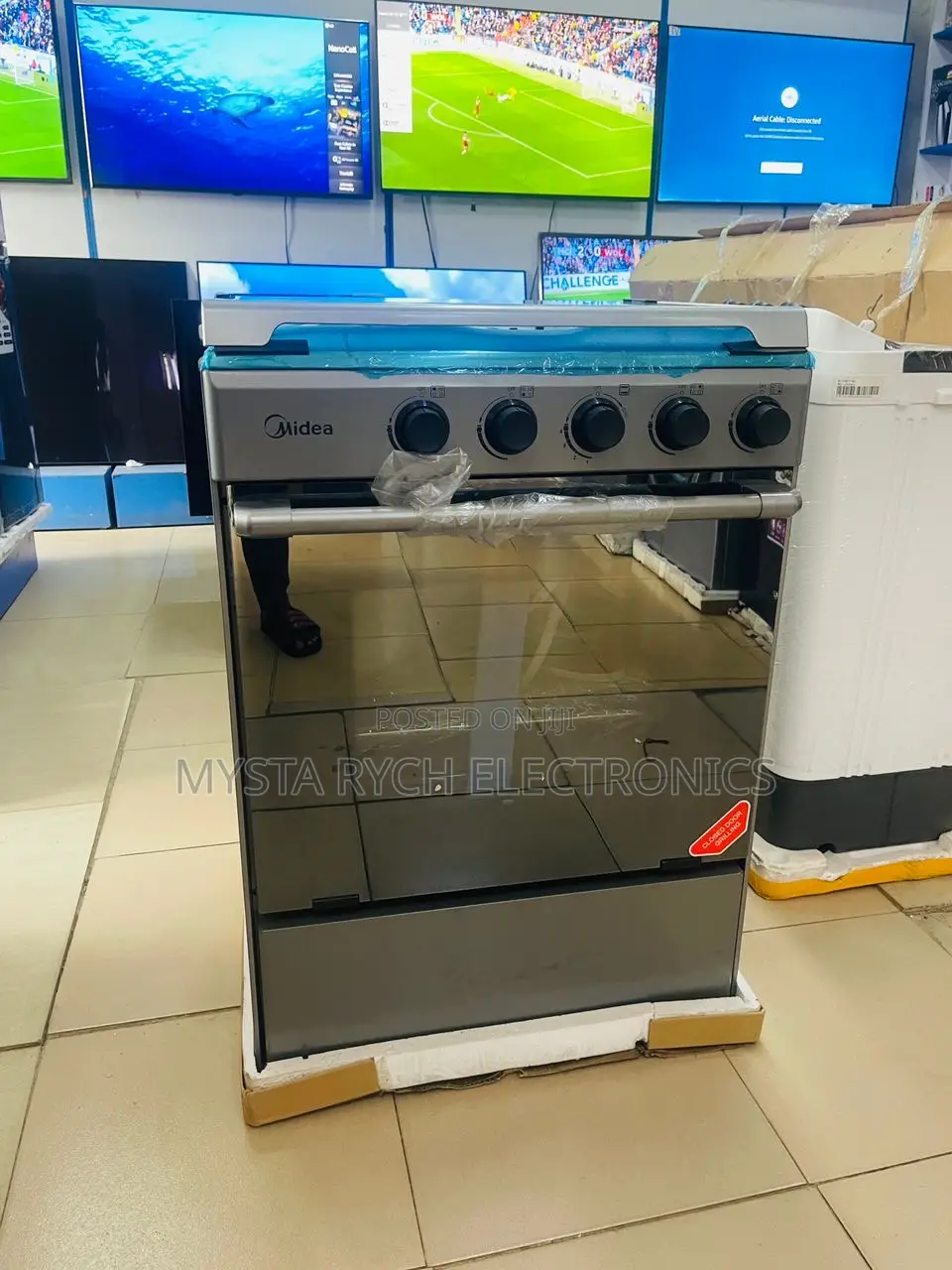 New Midea 60 by 60 4 Burner Gas Cooker + Grill