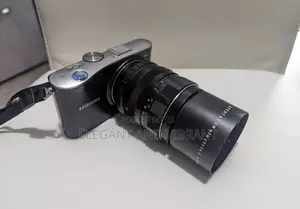 Samsung Nx100 Camera With 20-50mm Lens+ Pentacon 2.8 135mm