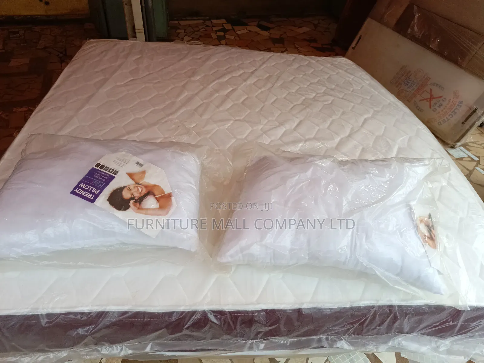 A Pair of Cotton or Othopedic Pillows.Free Delivery