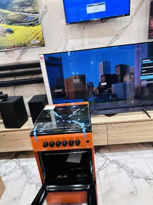 Orange Color Gas Cooker Oven 4burner Volcano