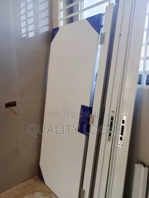 White, Brown and Black Wooden Doors