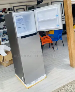 Extremely Chilling Samsung RT-31 310 Top Freezer Fridge.