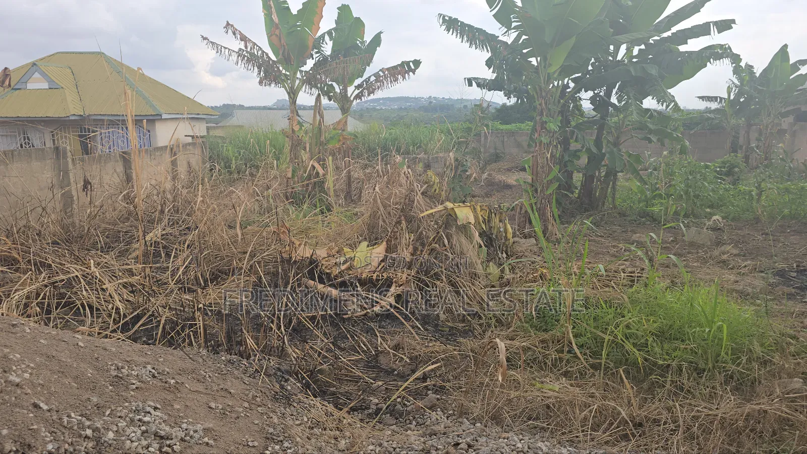 A Wall and Gated Land at Maase-Adubinso for Sale