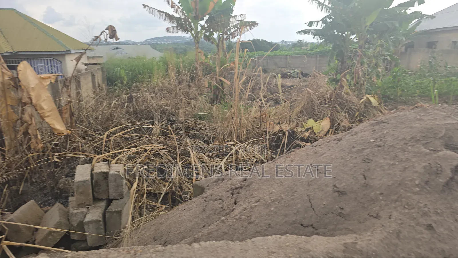 A Wall and Gated Land at Maase-Adubinso for Sale