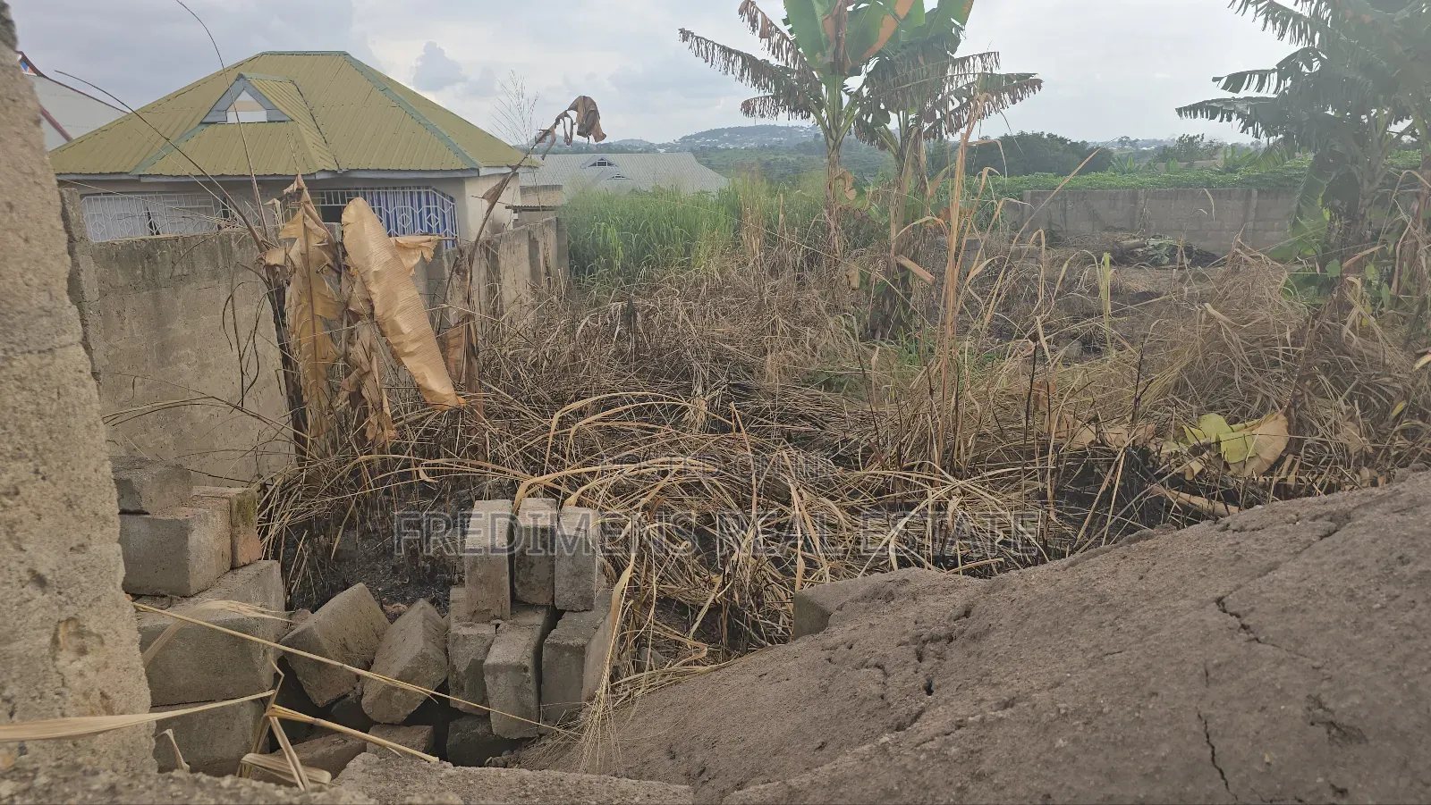 A Wall and Gated Land at Maase-Adubinso for Sale