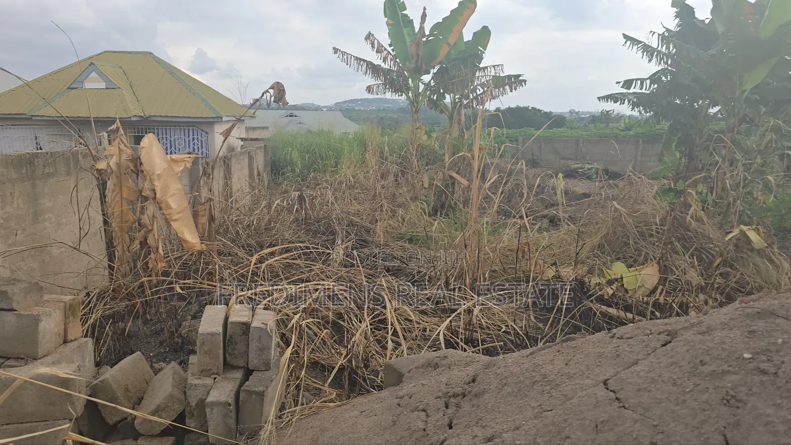 A Wall and Gated Land at Maase-Adubinso for Sale