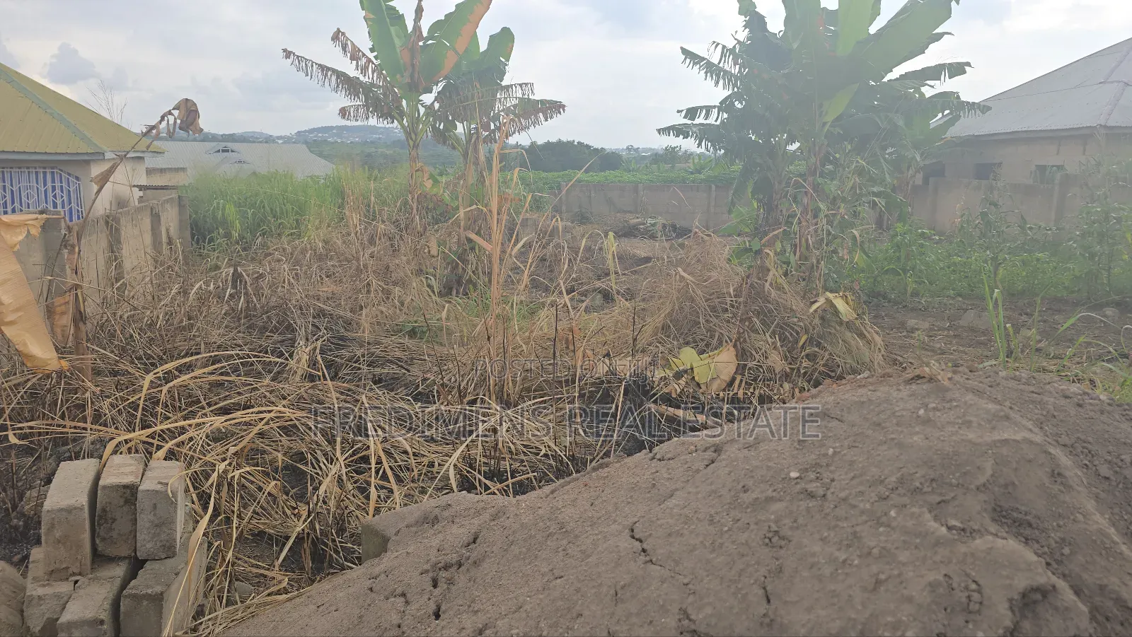 A Wall and Gated Land at Maase-Adubinso for Sale
