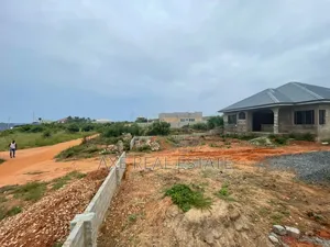 Get Half Plot // Developed Location - Tema Community 25