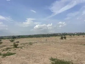 Call Living Large Properties for a Plot of Land for Sale