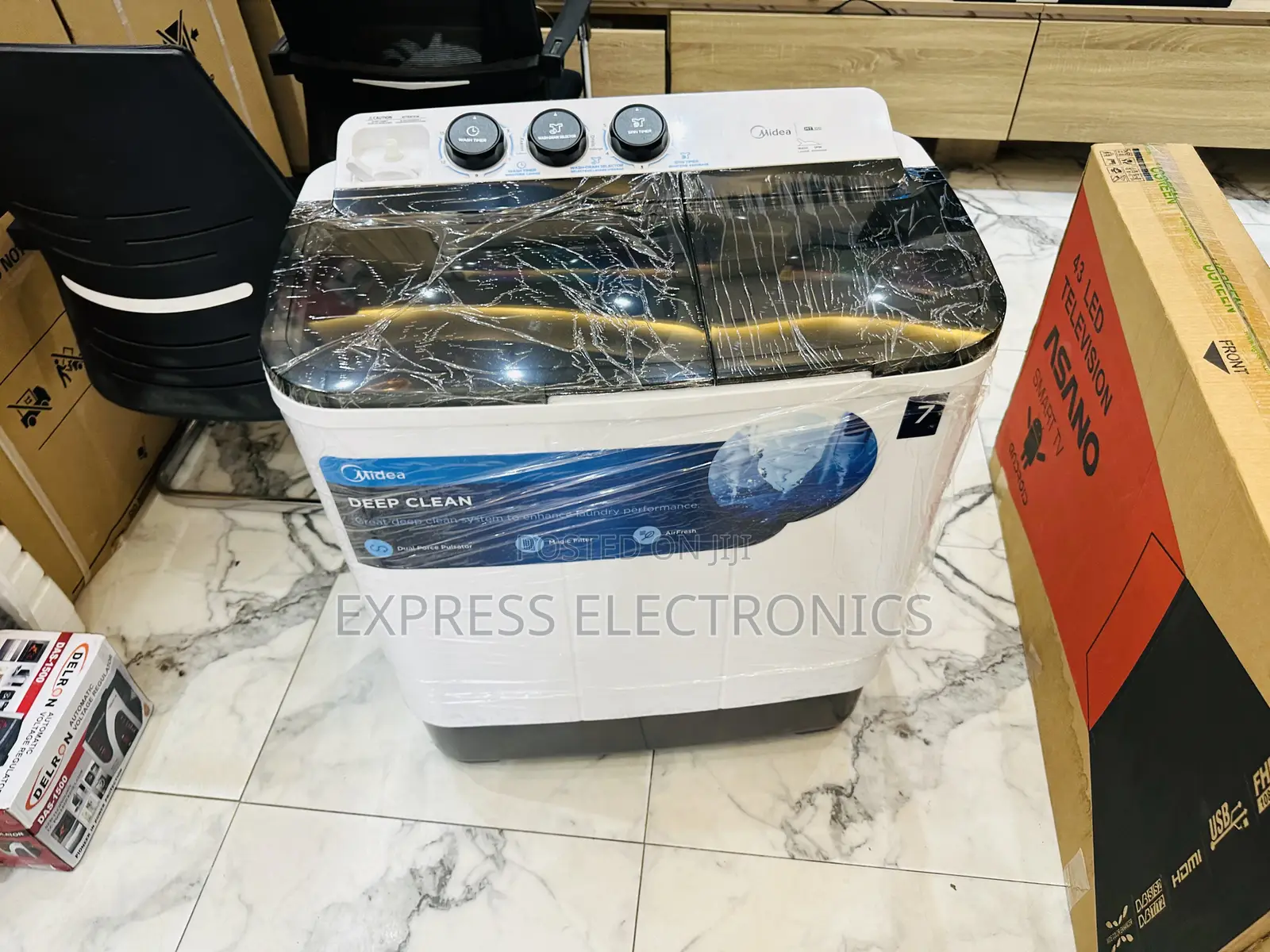 Quality Sleek New Washing Machine 7kg Top Load Midea.
