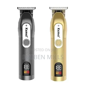 Black and Gold Kemei Clipper Barbering Machine Beard Trimmer