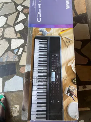 Yamaha Keyboard PSR E 383 Black With Purple Colour