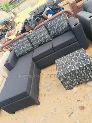 Plenty in the Warehouse L Shaped Sofa Chair With Table