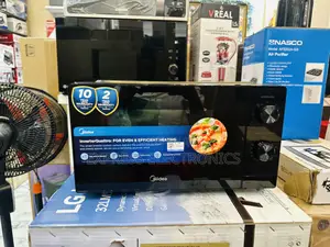 We Extremely Cool Price Microwave Oven Black 20L Midea