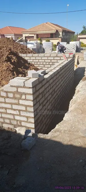 We Are a Good Company Construction Worker.Face Wall . House