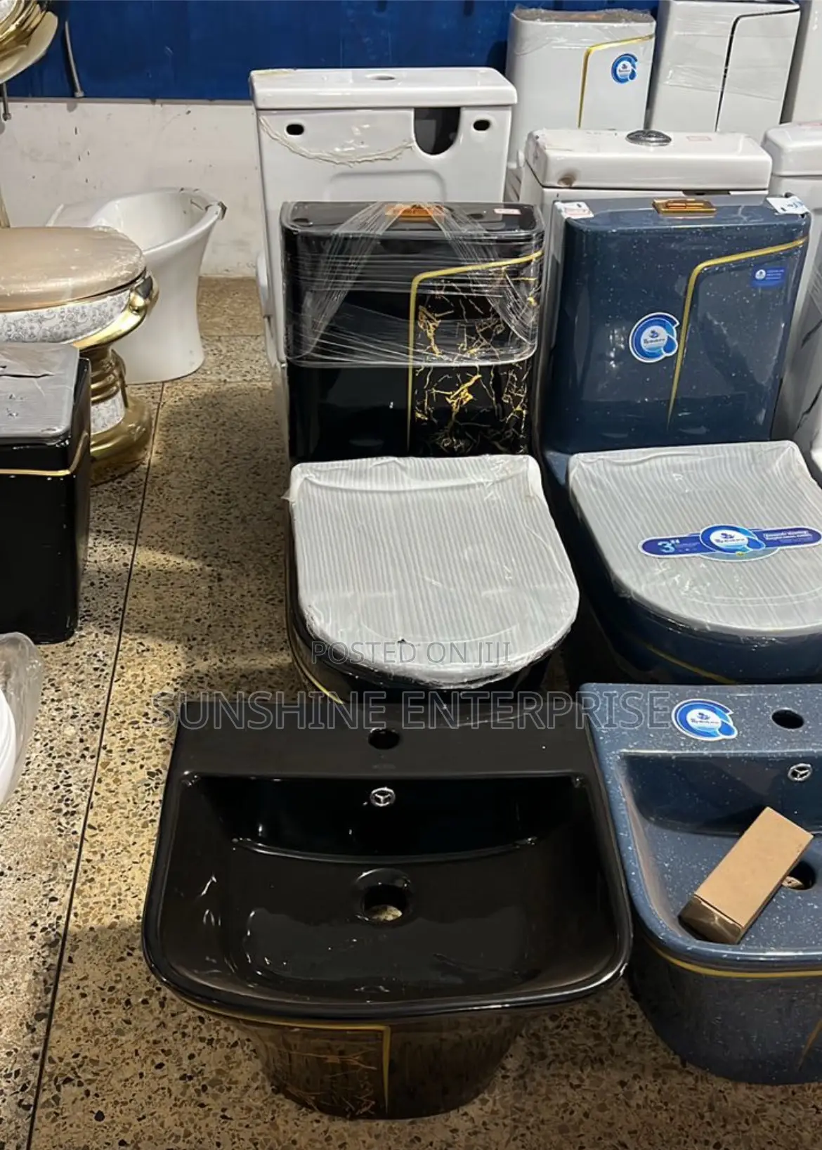 Black And Gold Water Closet With Basin
