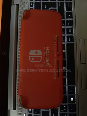 Nintendo Switch Lite With Fc 25, Mk 11 Other Games