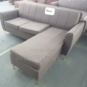 Luxurious Brown L Shape Sofa Chair.
