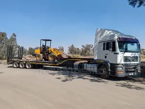 Lowbed Trailer Trucks for Rental / Hiring