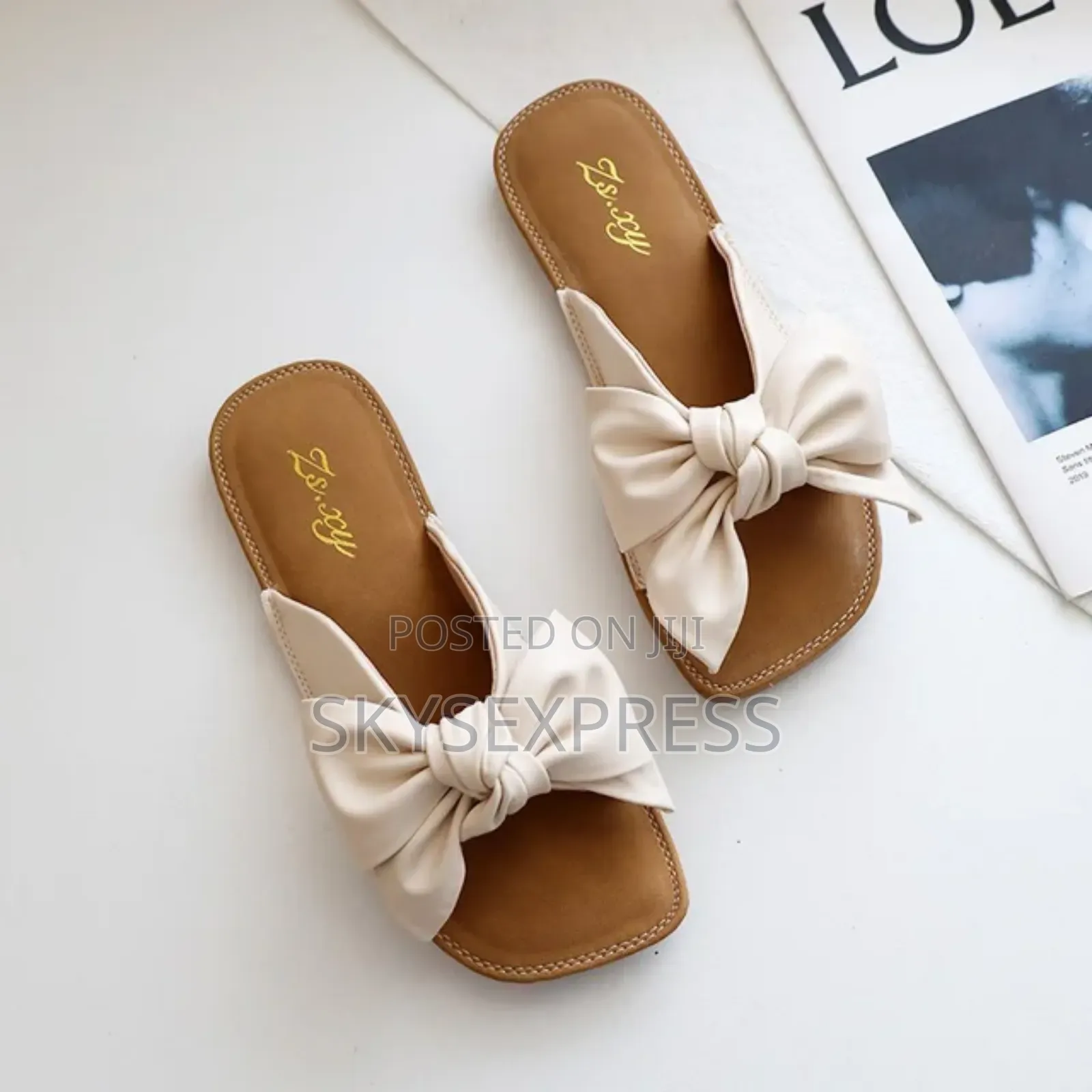 Ladies Slippers With a Bow Tie