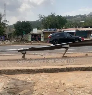 1 Acre Main Roadside Land at Ayi Mensah
