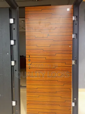 Single Brown Exterior Security Door With Accessories