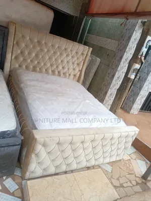 Cream Colored 80/60 Mattress With Frame . Free Delivery