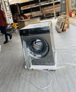 Effortless Cleaning Nasco 11kg Front Load Washing Machine.