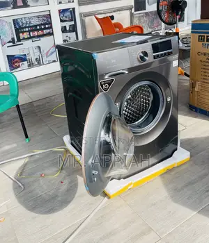 Smart Wash TCL 10.5kg Front Load Washing Machine.