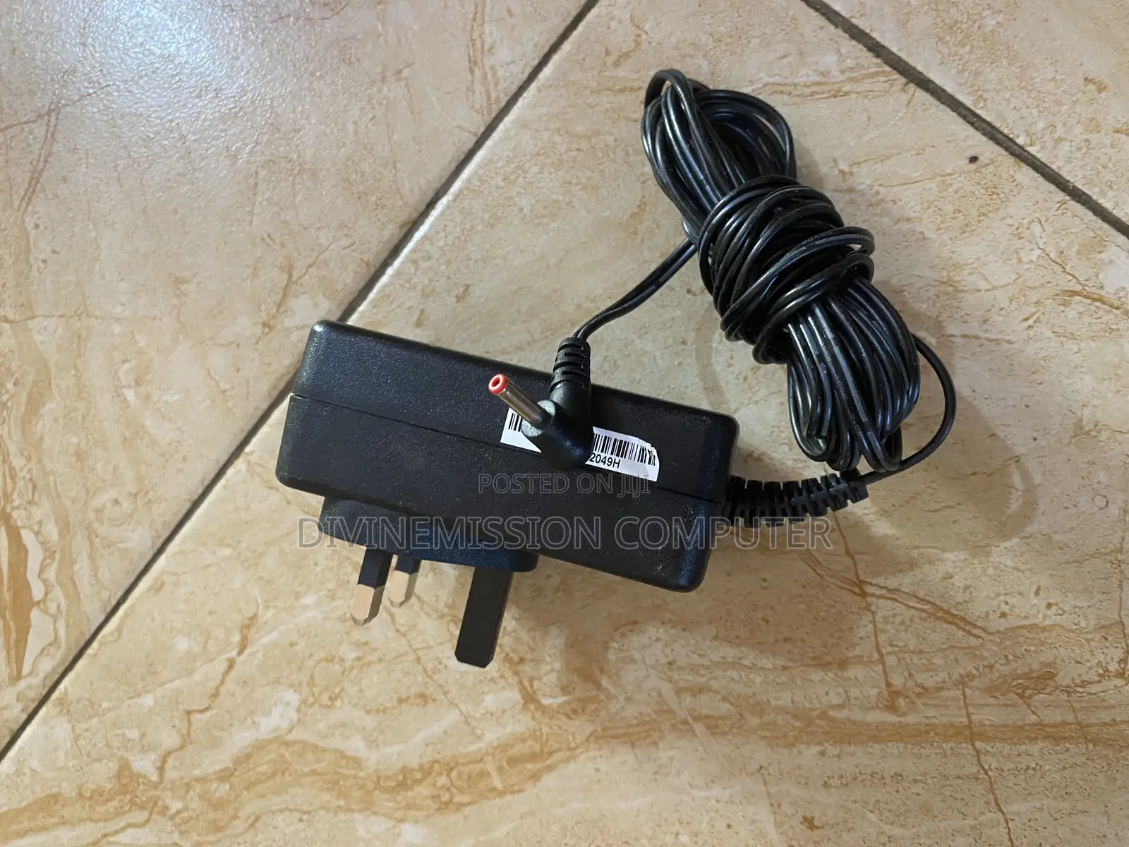 TM1 12v 2A Laptop Charger/Adapter Original.