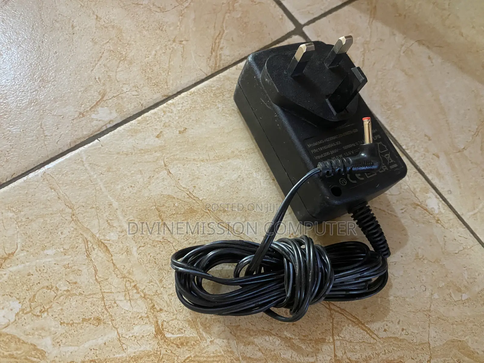 TM1 12v 2A Laptop Charger/Adapter Original.