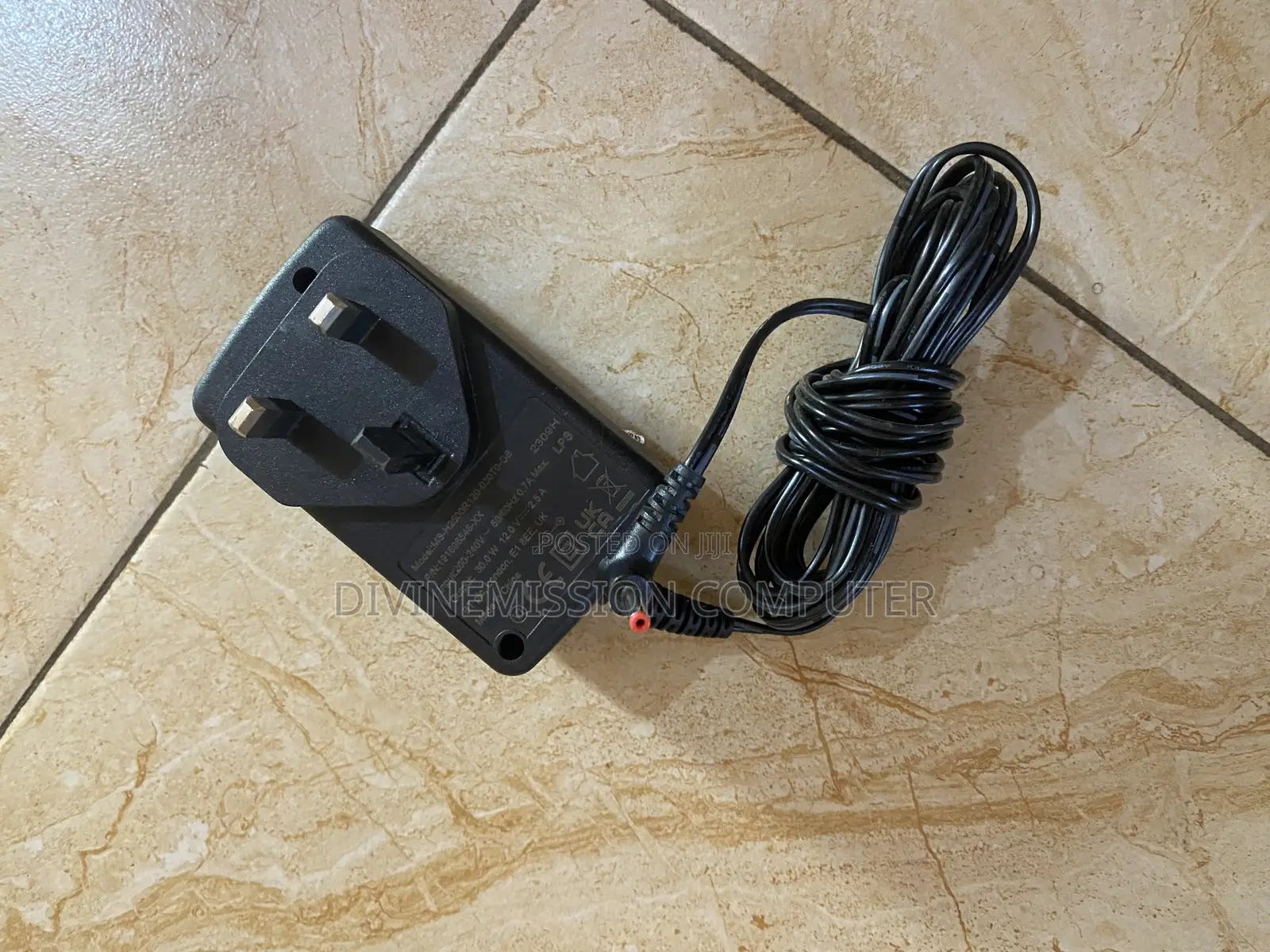 TM1 12v 2A Laptop Charger/Adapter Original.