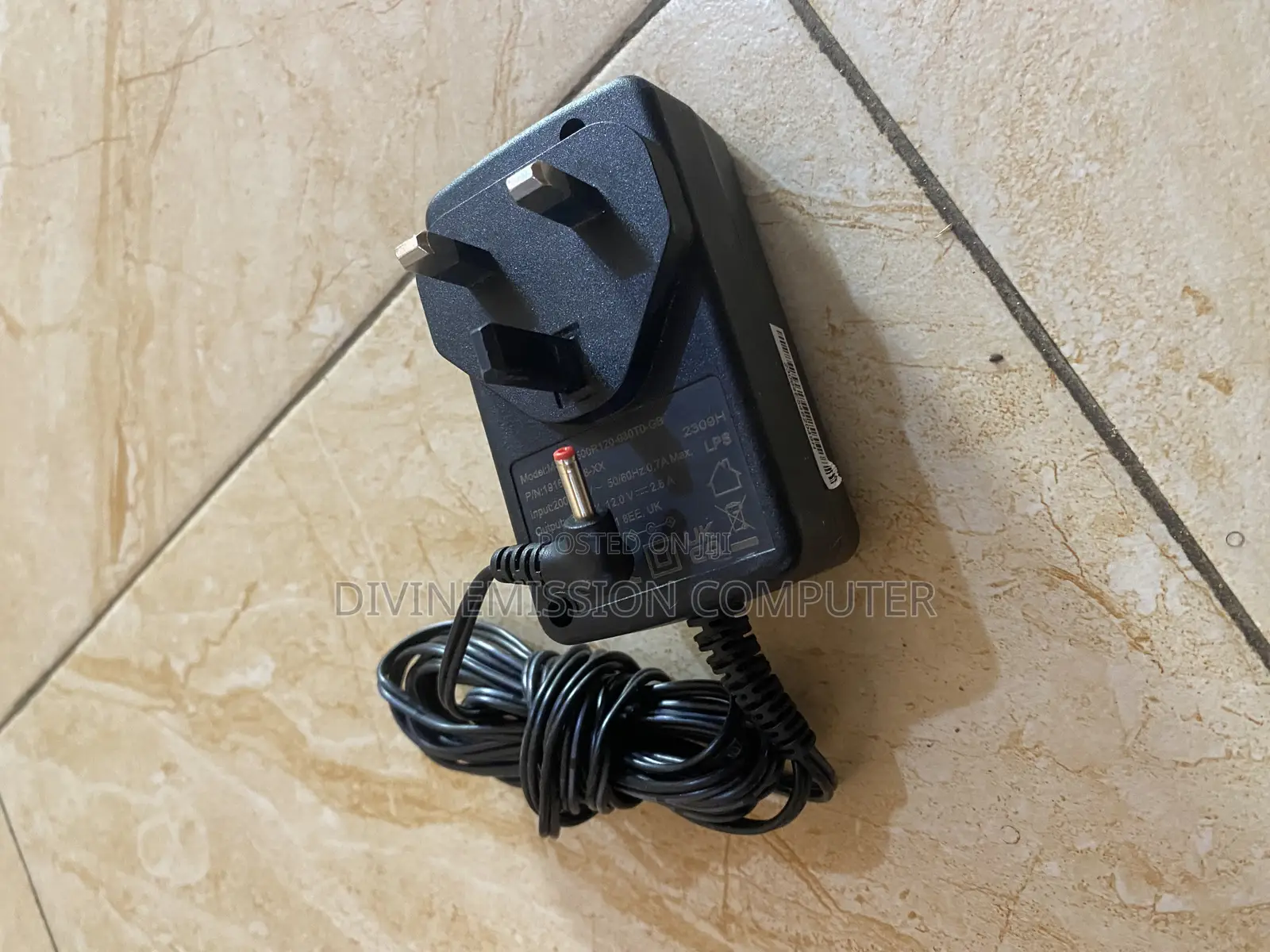 TM1 12v 2A Laptop Charger/Adapter Original.