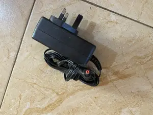 TM1 12v 2A Laptop Charger/Adapter Original.