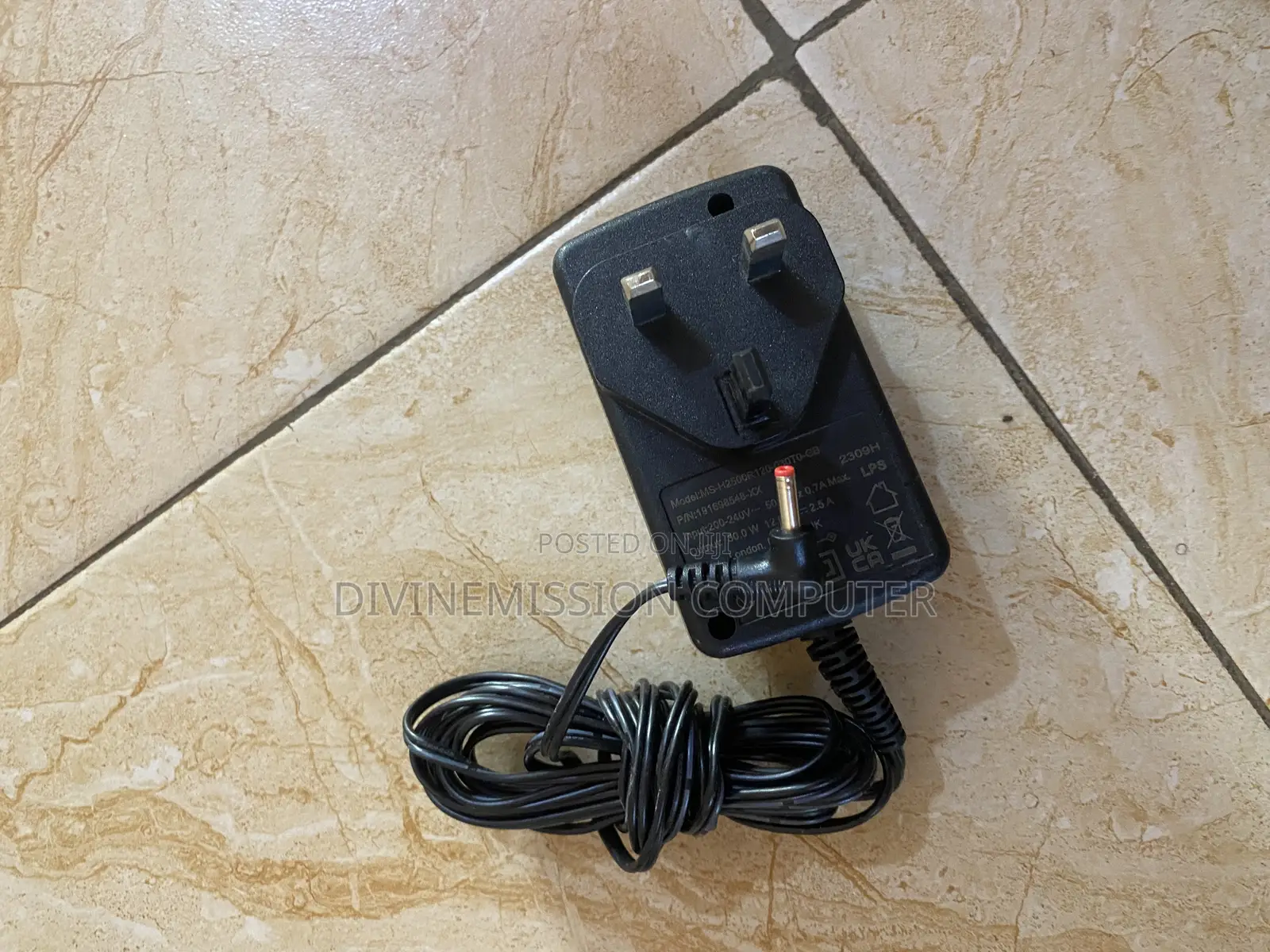 TM1 12v 2A Laptop Charger/Adapter Original.