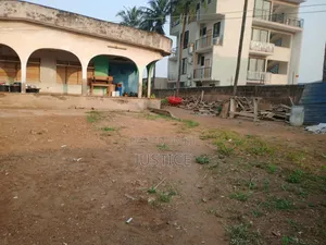 1 Acre Land on Side of Main Road West Legon