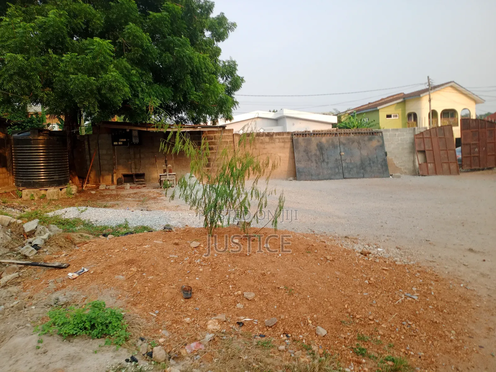 1 Acre Land on Side of Main Road West Legon