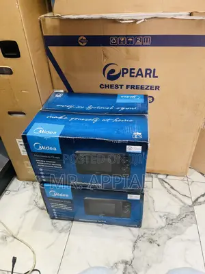 Defrosting Midea 20ltr Electric Countertop Microwave 