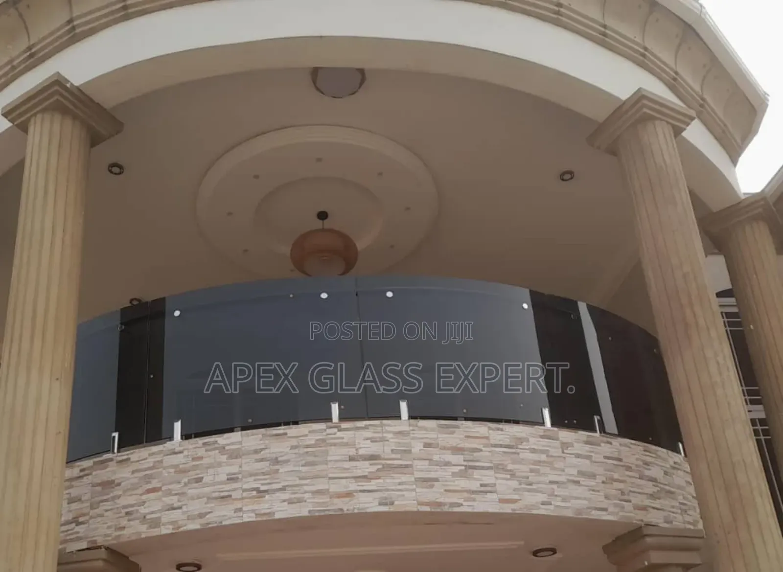 Curved Glass for Balcony With Spigot Support System.