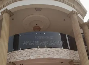 Curved Glass for Balcony With Spigot Support System.