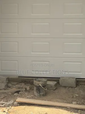 Automated Garage Door With Fanlight and Remote